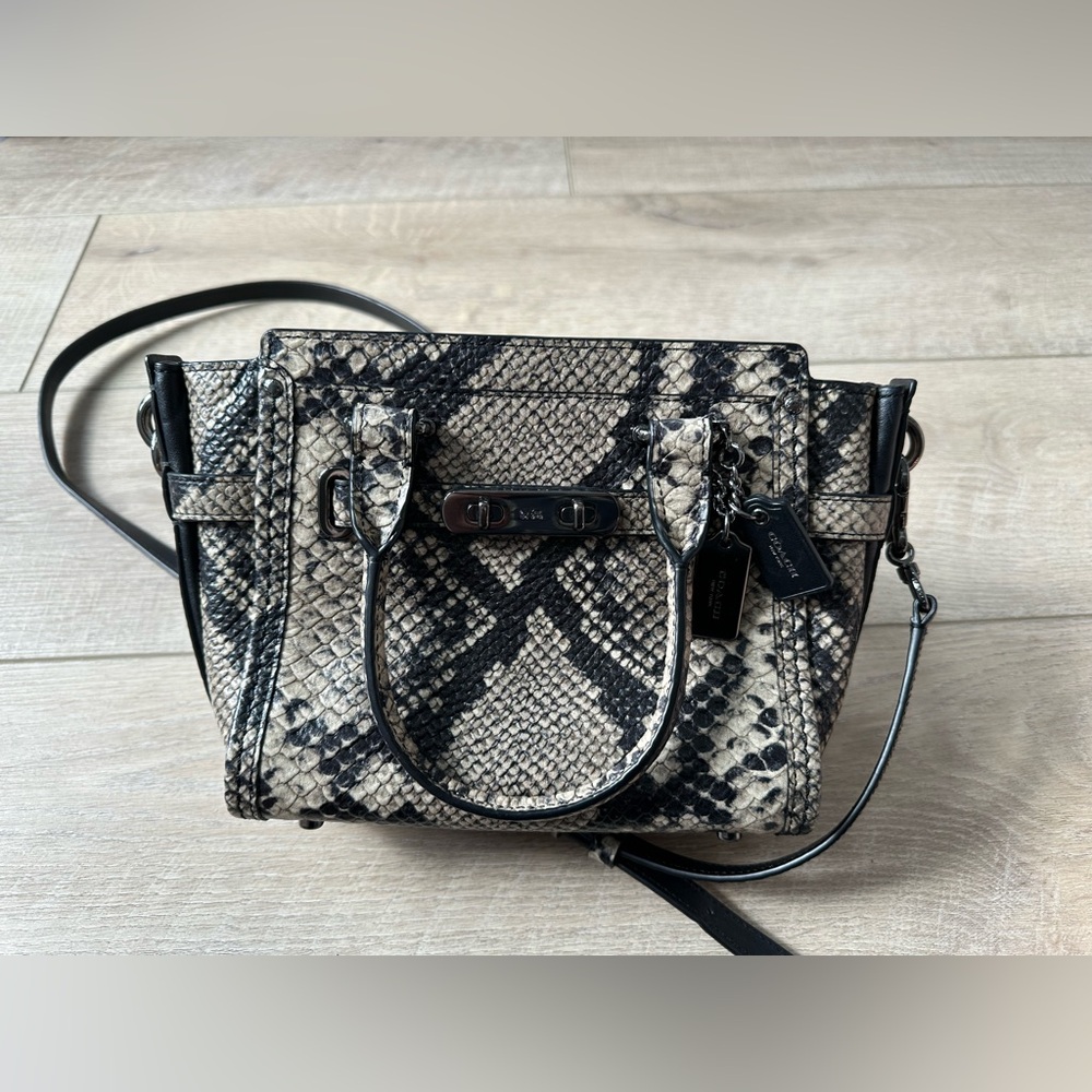 Coach Swagger 21 In Snake Embossed
Leather crossbody purse